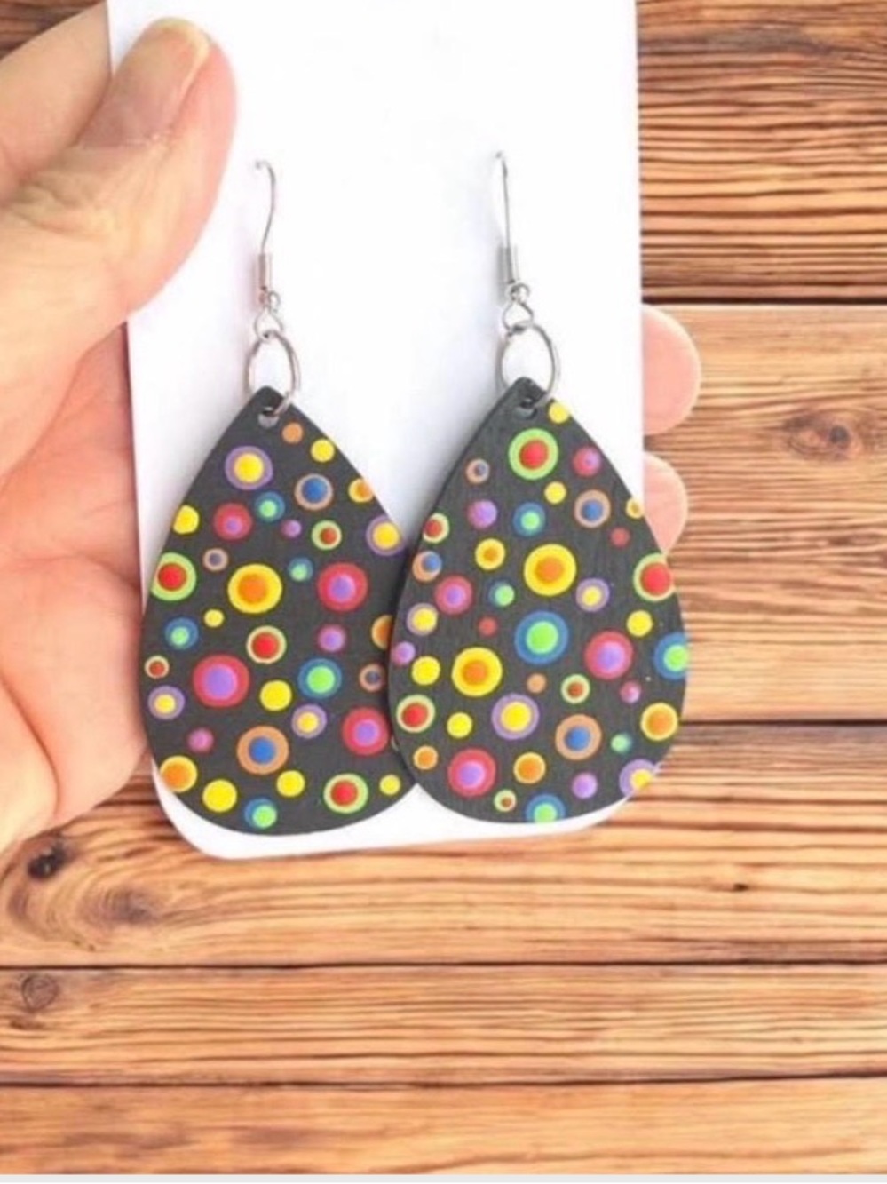 Dot-painted 2” colorful teardrop rainbow earrings multicolored on black